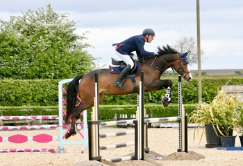James Askew wins the Equissage Pulse Senior British Novice Second Round at Port Royal Showground